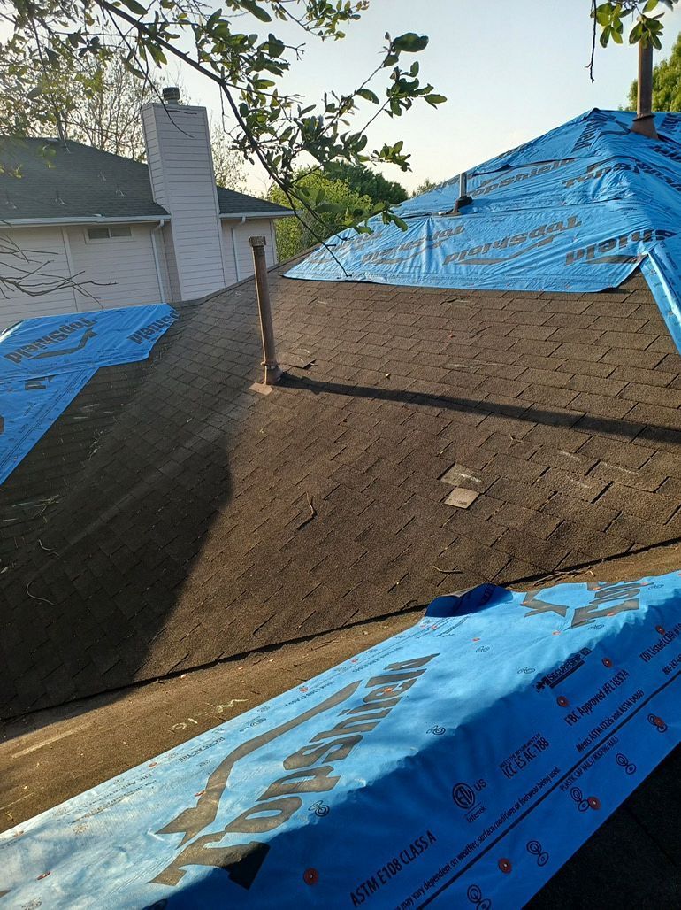 Emergency Roof Tarps by Austin Roofing and Construction