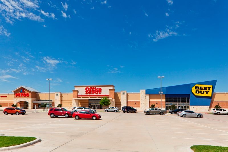 Stone Hill Town Center Pflugerville Texas - Modified Bitumen & Metal Roofing System by Austin Roofing and Construction