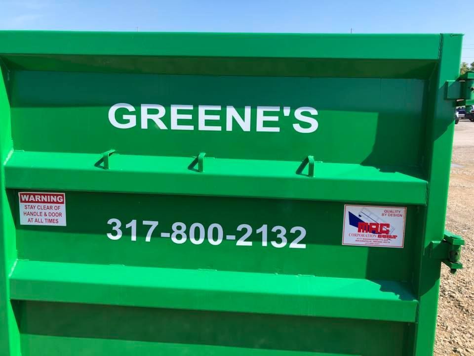 Green dumpster with GREENE'S and phone number 317-800-2132 on the side.