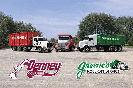 Three trucks with company logos. Two trucks have containers. Red and green containers. Three trucks with company logos. Two trucks have containers. Red and green containers.