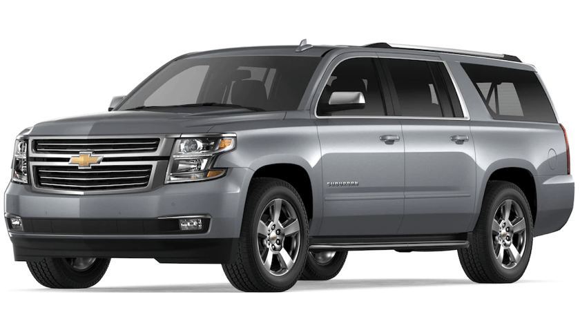 a silver chevrolet suburban suv is shown on a white background .