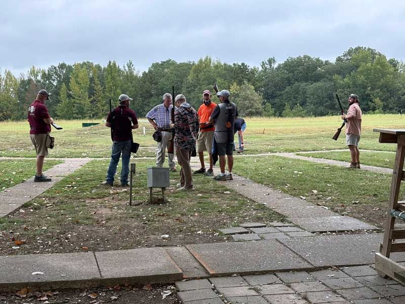 People at a shooting range. 