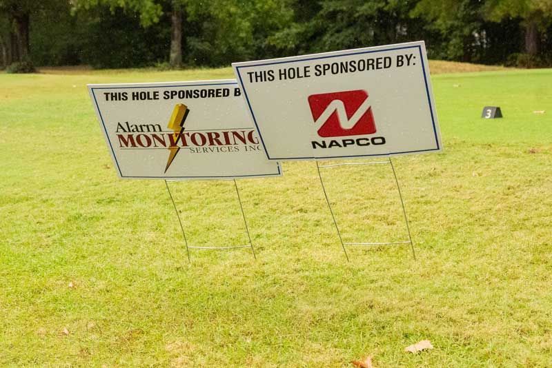 Two golf course signs.