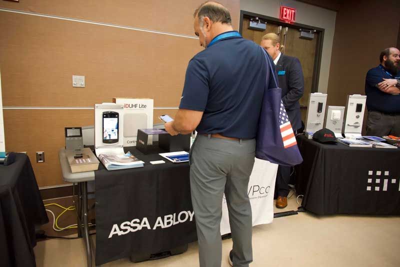 Man looking at product display at a trade show.