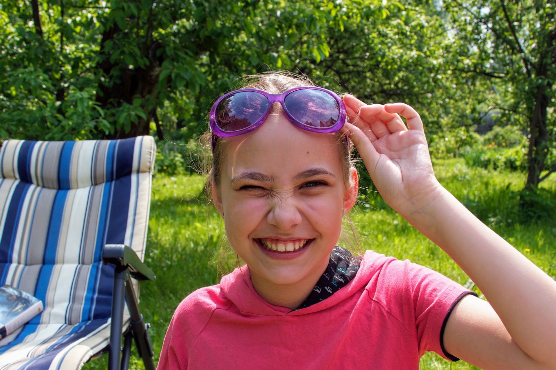 Teen and parent smiling outdoors at Towne Lake Family Dentistry — Invisalign vs. braces in Woodstock, GA