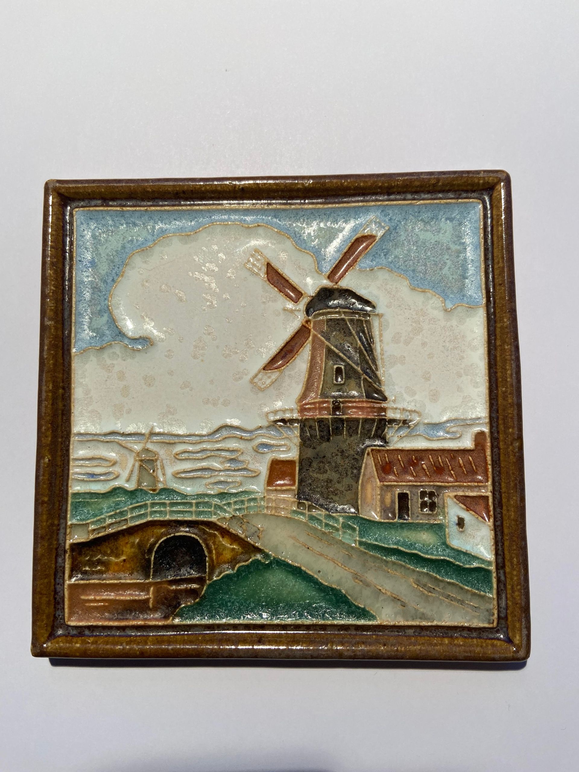 PFtile Porceleyne Fles Delft Cloisonne tile mills and farms.