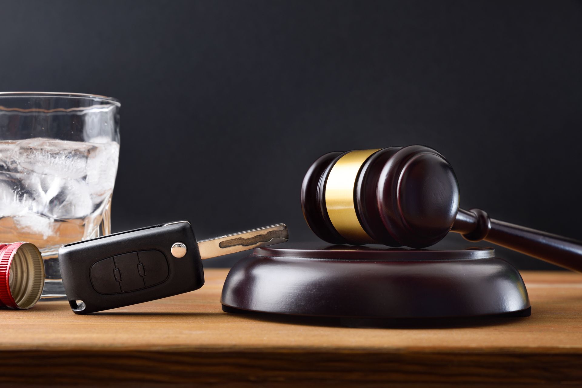 The car key with gavel and glass The car key with gavel and glass