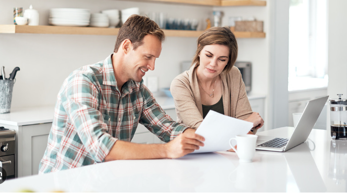 Couple reviewing documents.
