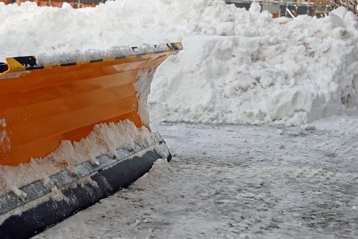 Snow plowing equipment
