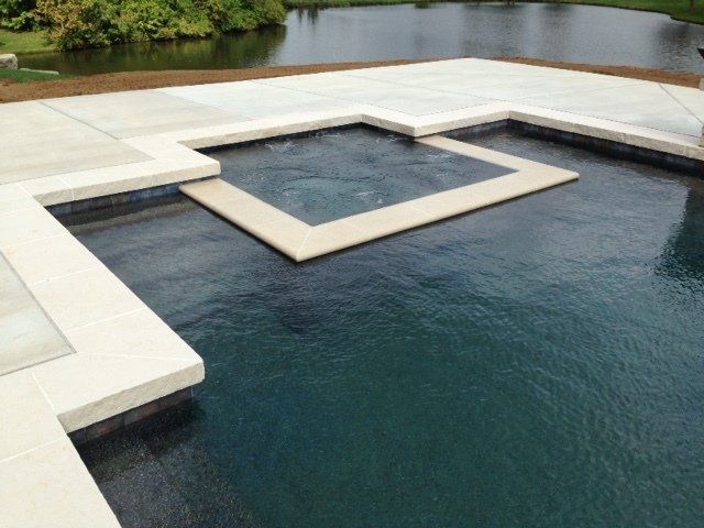 classic pool with square spa