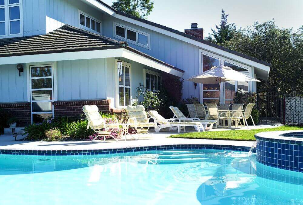 Pool and spa in a residential white house