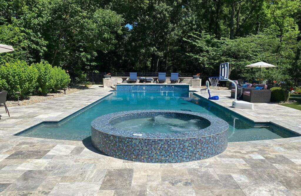 Rectangular swimming pool with circular spa