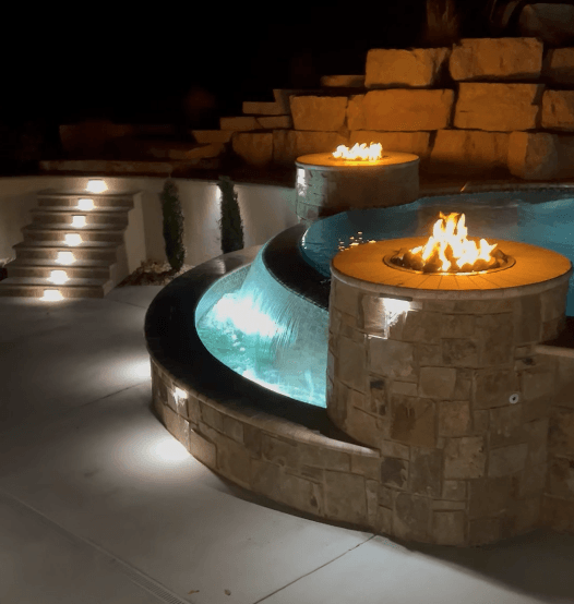 Fire pits around a luxury pool