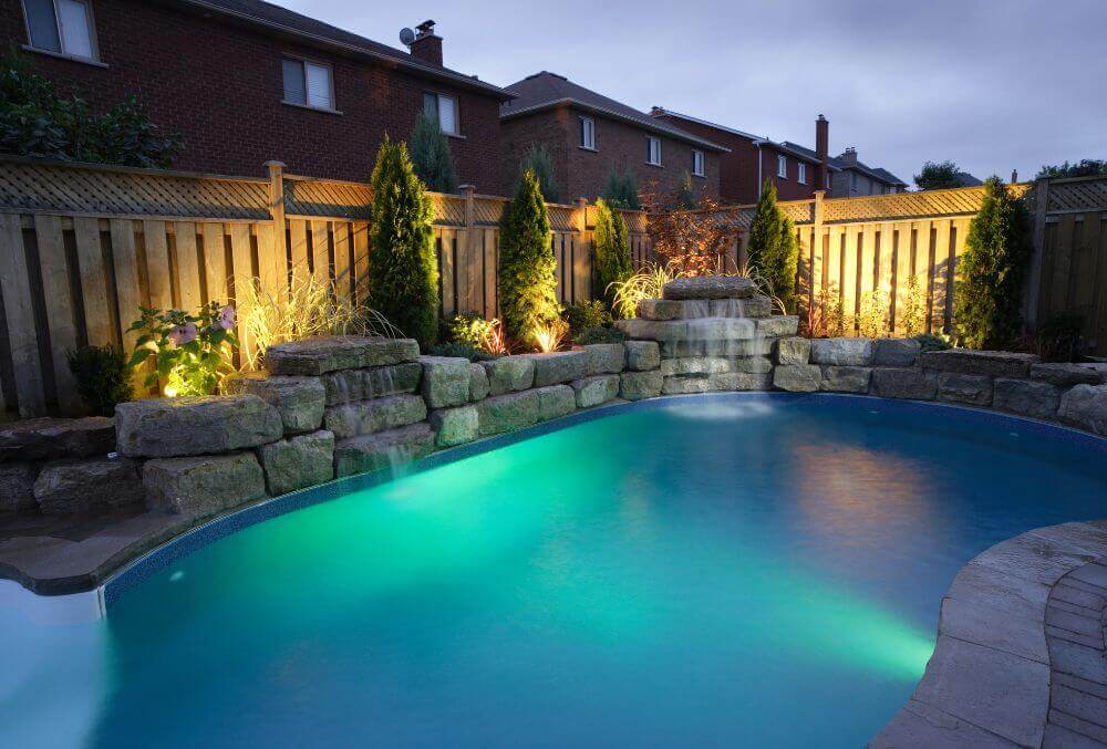 Two rock waterfall feature in a custom sized residential pool