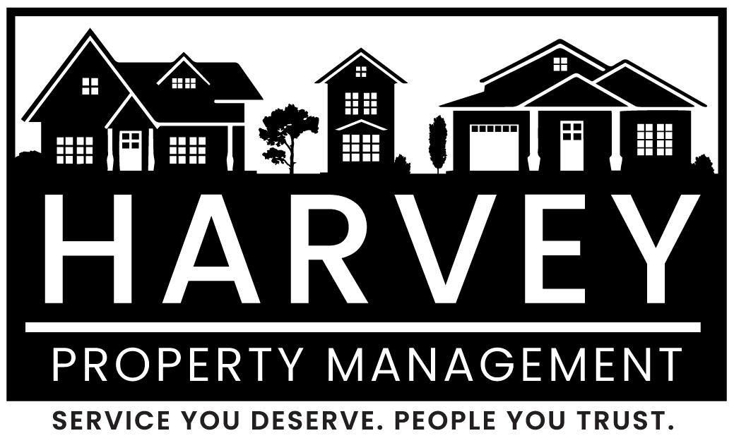 Harvey Property Management logo featuring silhouettes of houses and the company name.