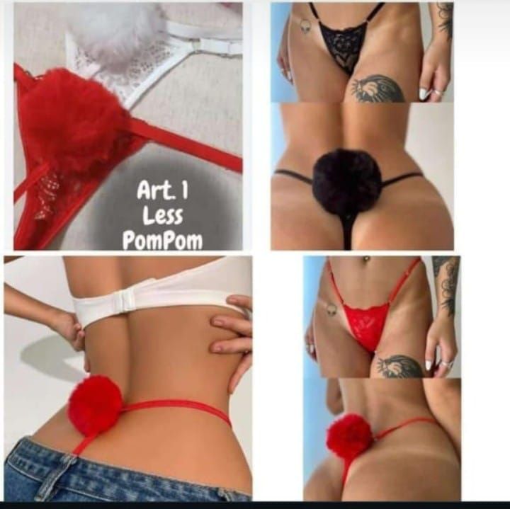 Mujer con jeans, sujetador blanco y tanga roja con pompón en la espalda.