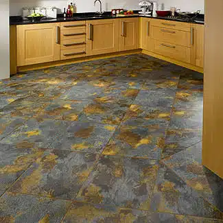 A kitchen with a tile floor and wooden cabinets.