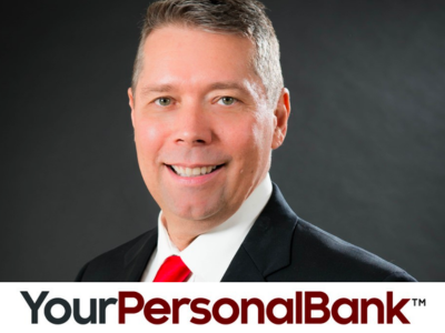 Your Personal Bank logo with a smiling man in a black suit and red tie