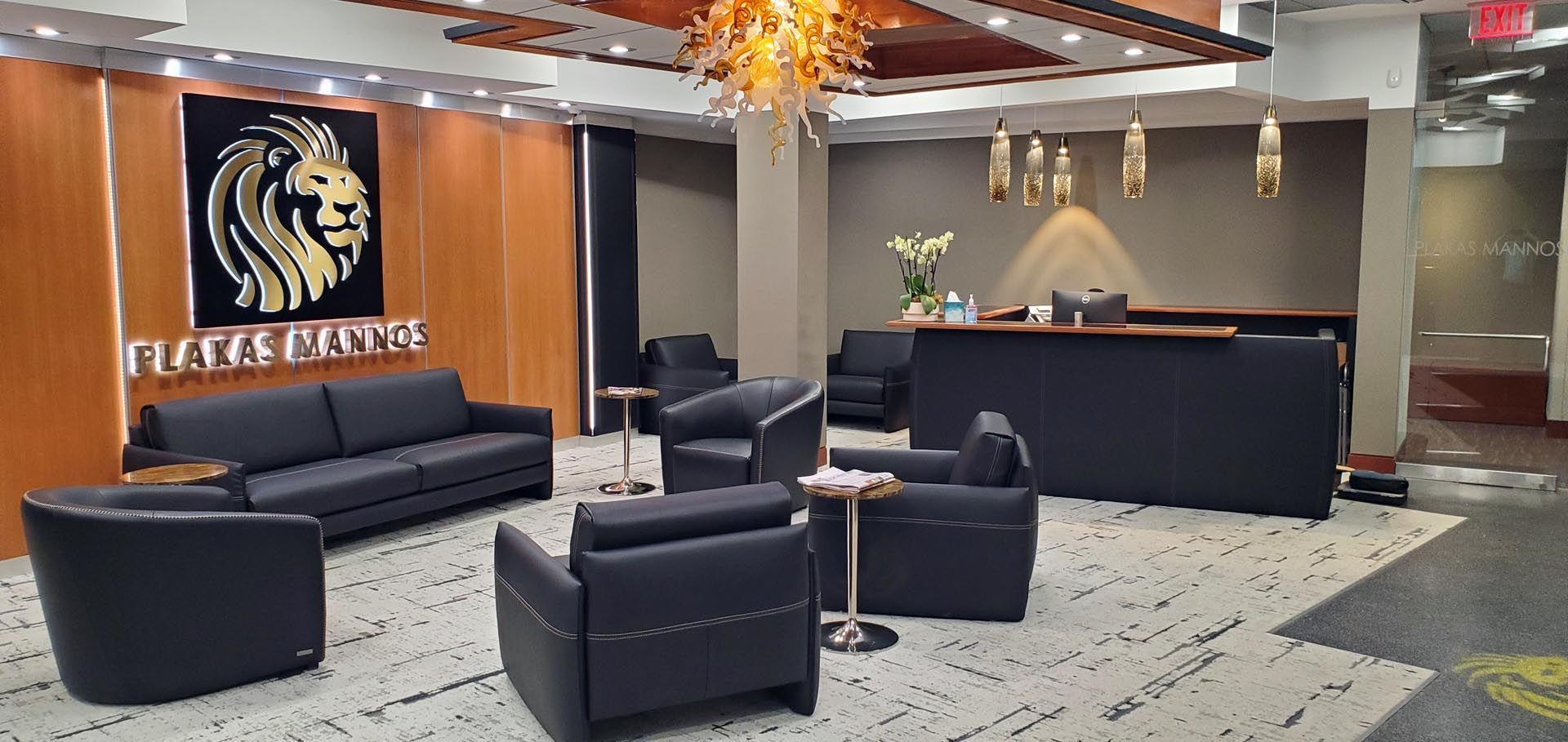 an office with a lion logo on the wall