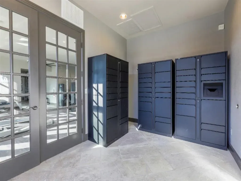 Package lockers in apartment building lobby