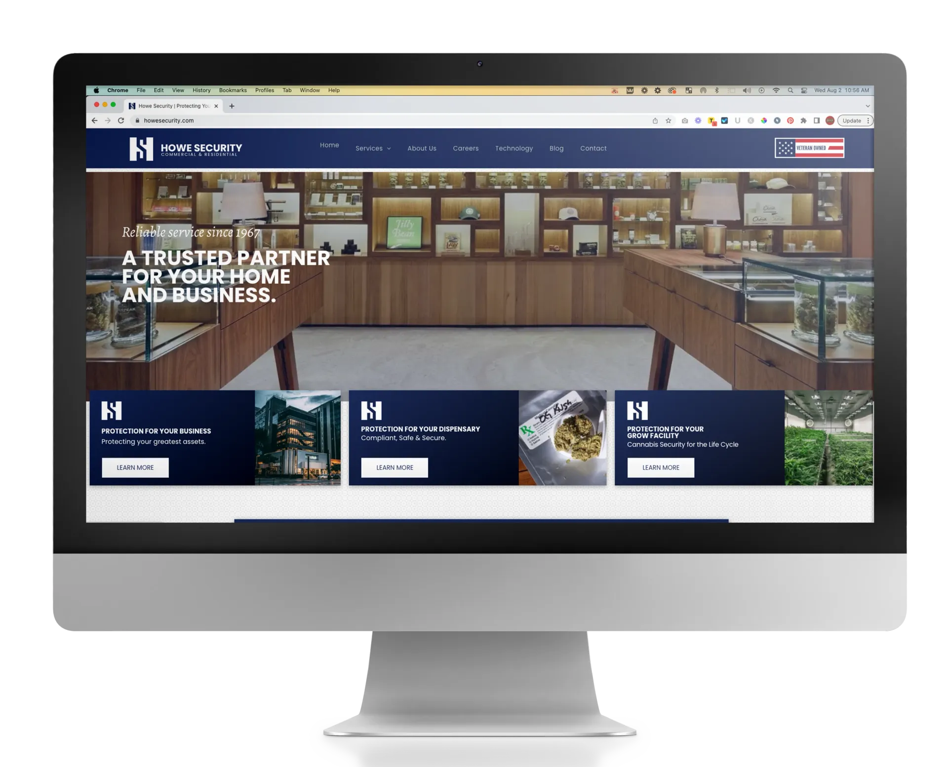 A computer monitor is open to a website that says a trusted partner for your home and business.
