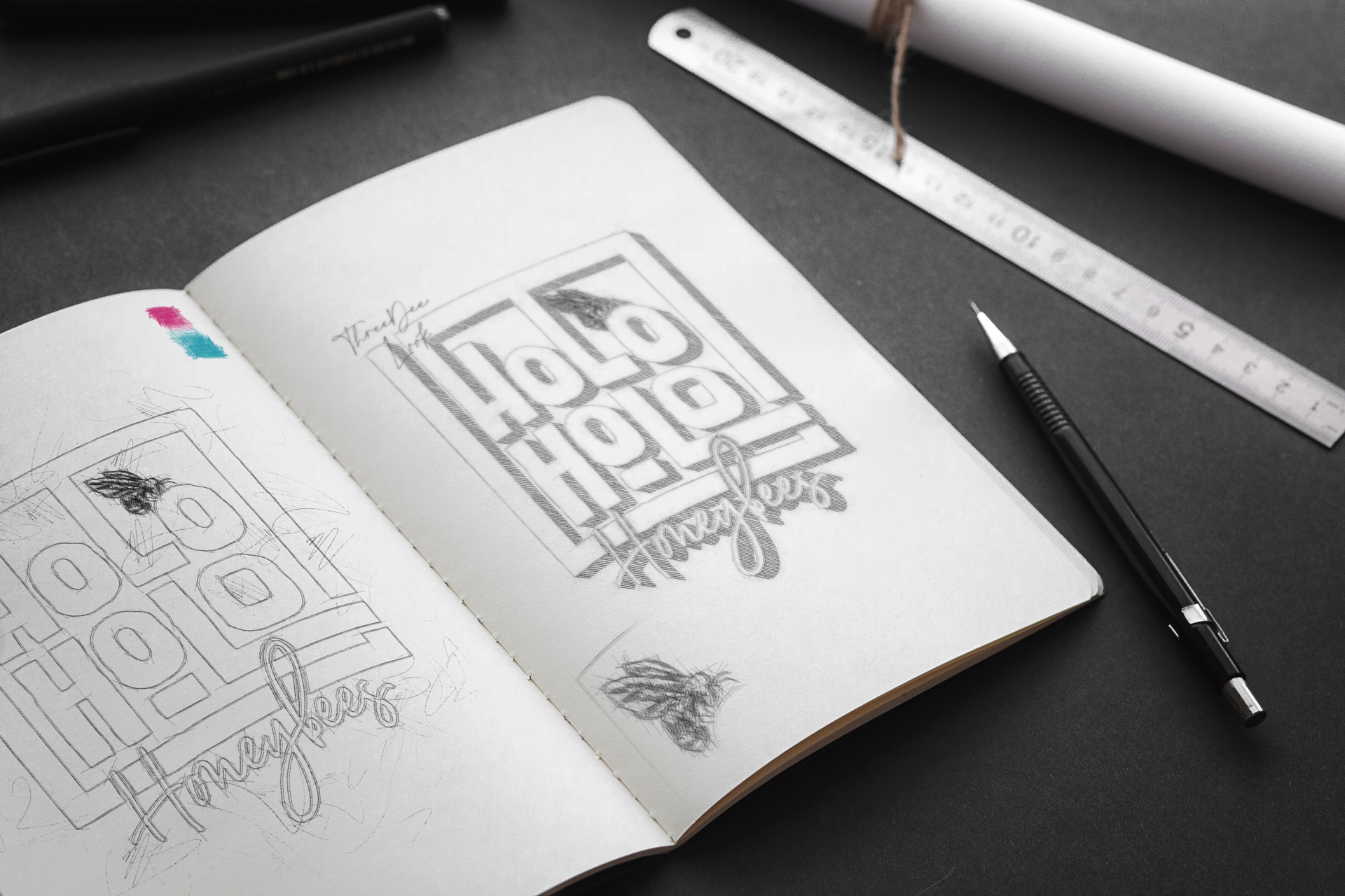 A notebook with a pencil and ruler on a table.