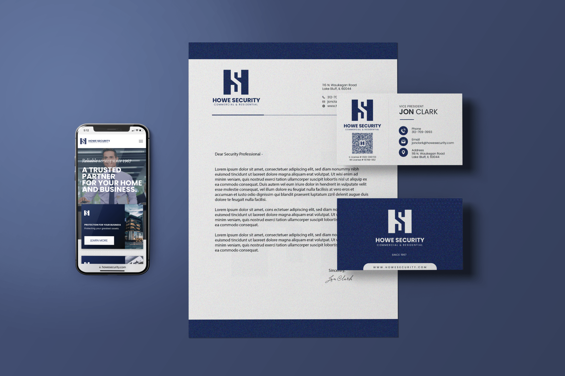 A letter , business card , and cell phone on a blue background.