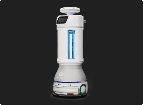 White autonomous disinfection robot, cylindrical shape, black background.