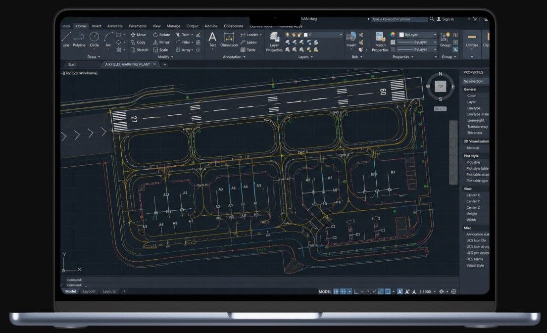 Laptop screen showing a dark software interface with a complex circuit-like diagram.