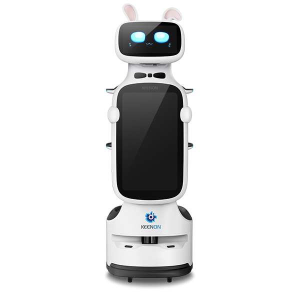White service robot with glowing blue eyes and a large black touchscreen display, standing upright on a base.