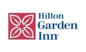 Hilton Garden Inn logo with pink flower icon and navy text on a white background