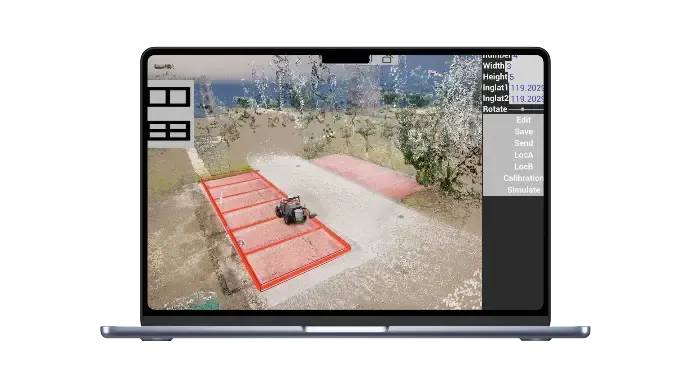 Laptop screen showing a top-down game scene with a small vehicle on a red path in a courtyard.