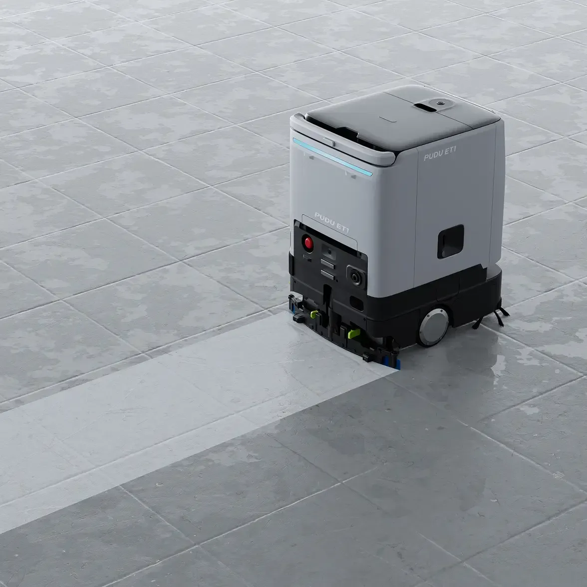 Worker in a warehouse operating a white automated cart between tall blue storage racks.