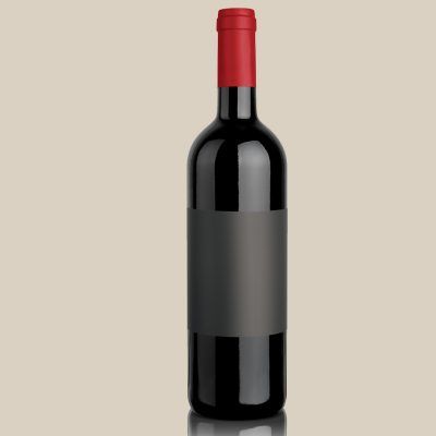A bottle of wine with a black label and a red cap