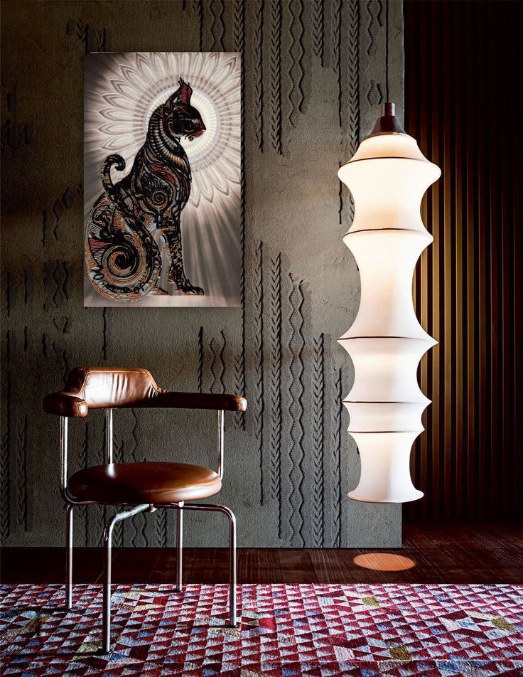 Decorative wall art with seahorse design, pendant light, and textured wall treatment