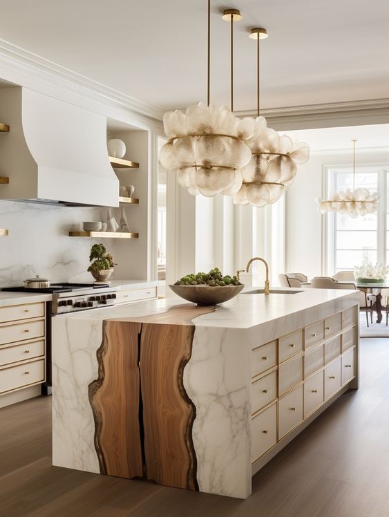 Bright elegant living space with sculptural chandelier, curved wall, and built-in shelves