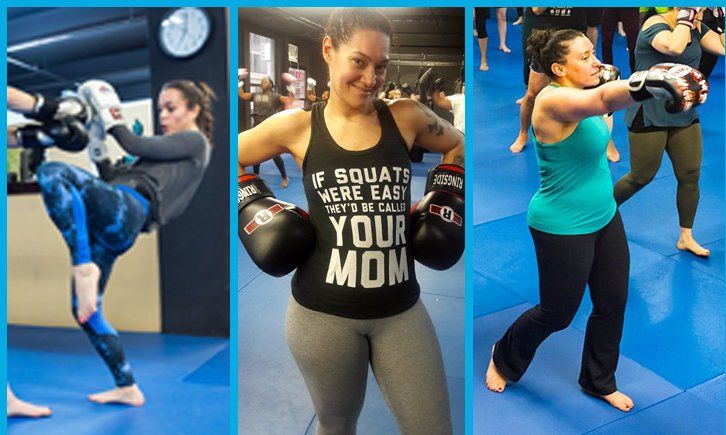 A woman wearing boxing gloves and a tank top that says your mom