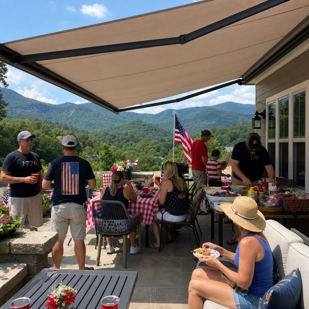 People gathered on a patio under a canopy, eating and chatting with a mountain view in the background.