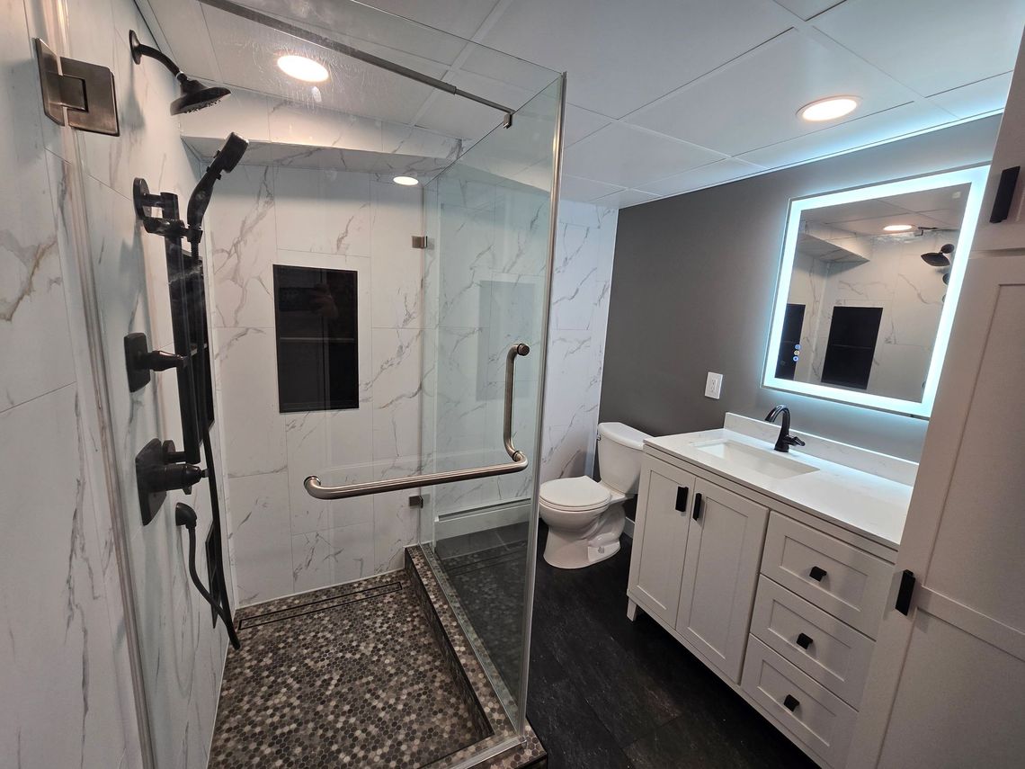 A before and after picture of a bathroom remodel.
