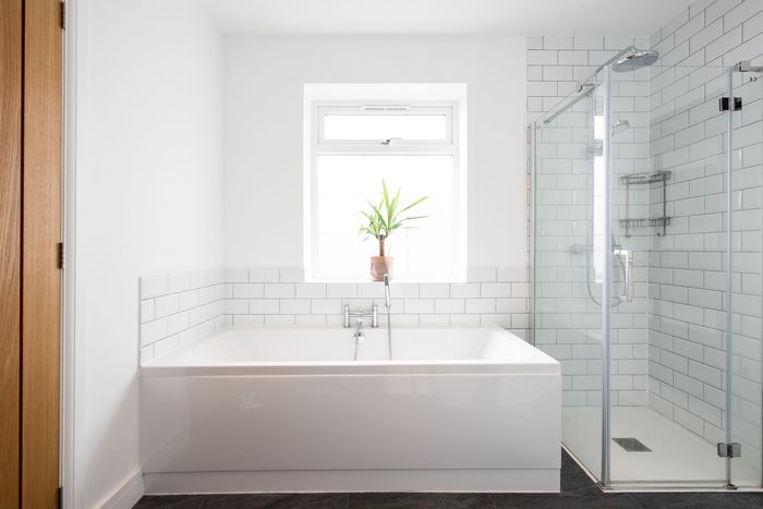 A Bathroom with A Bathtub and A Walk in Shower — Inverness, FL — First Class Refinishing 