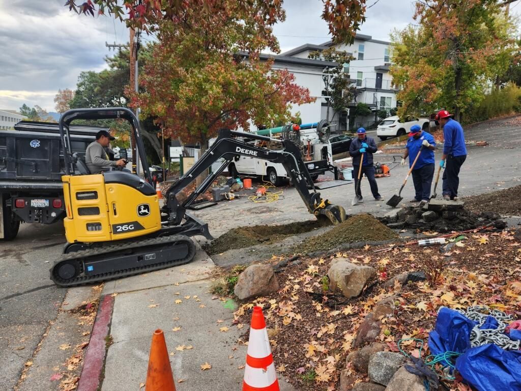 excavator is being used to dig a hole — Concord, CA — Warranted Plumbing Services Inc.