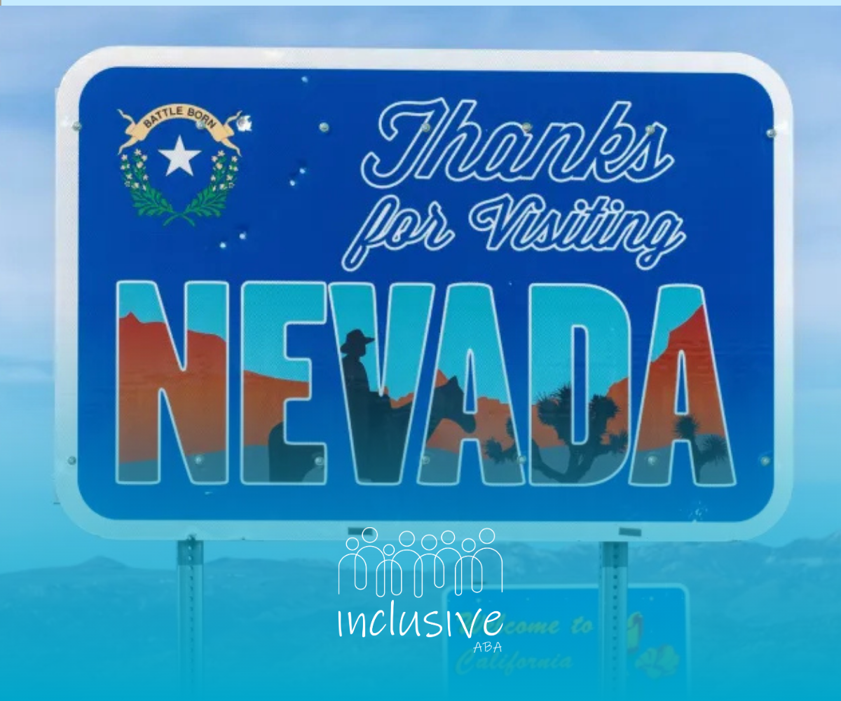 Blue Nevada highway sign reading “Thanks for Visiting NEVADA” with a state emblem and mountains in the letters