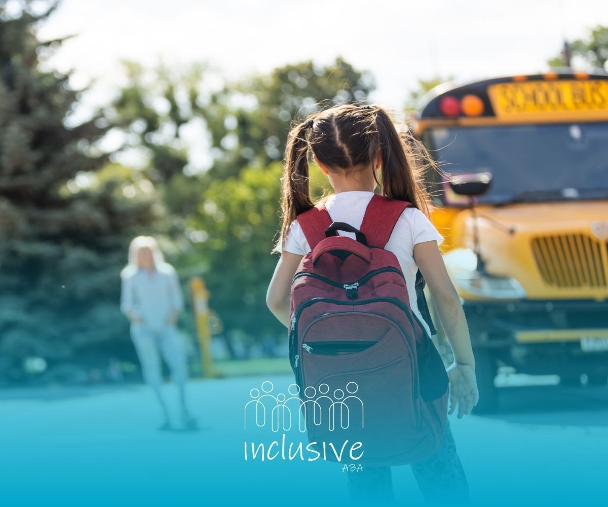 Child with backpack standing near a yellow school bus at curb