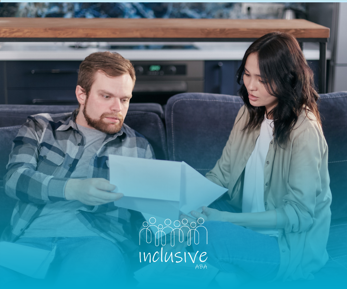 Two people reviewing a document