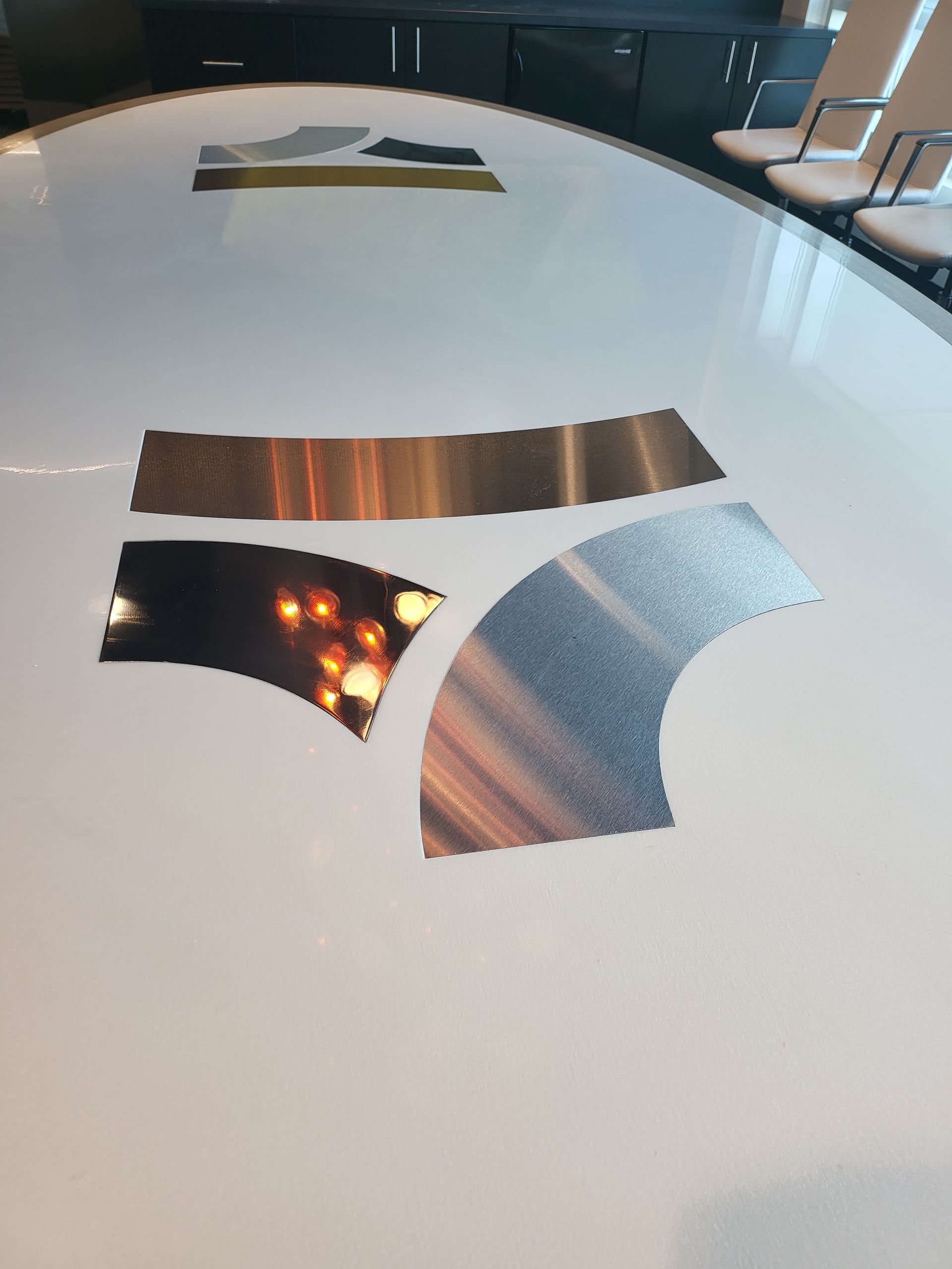 A large white table with a logo on it