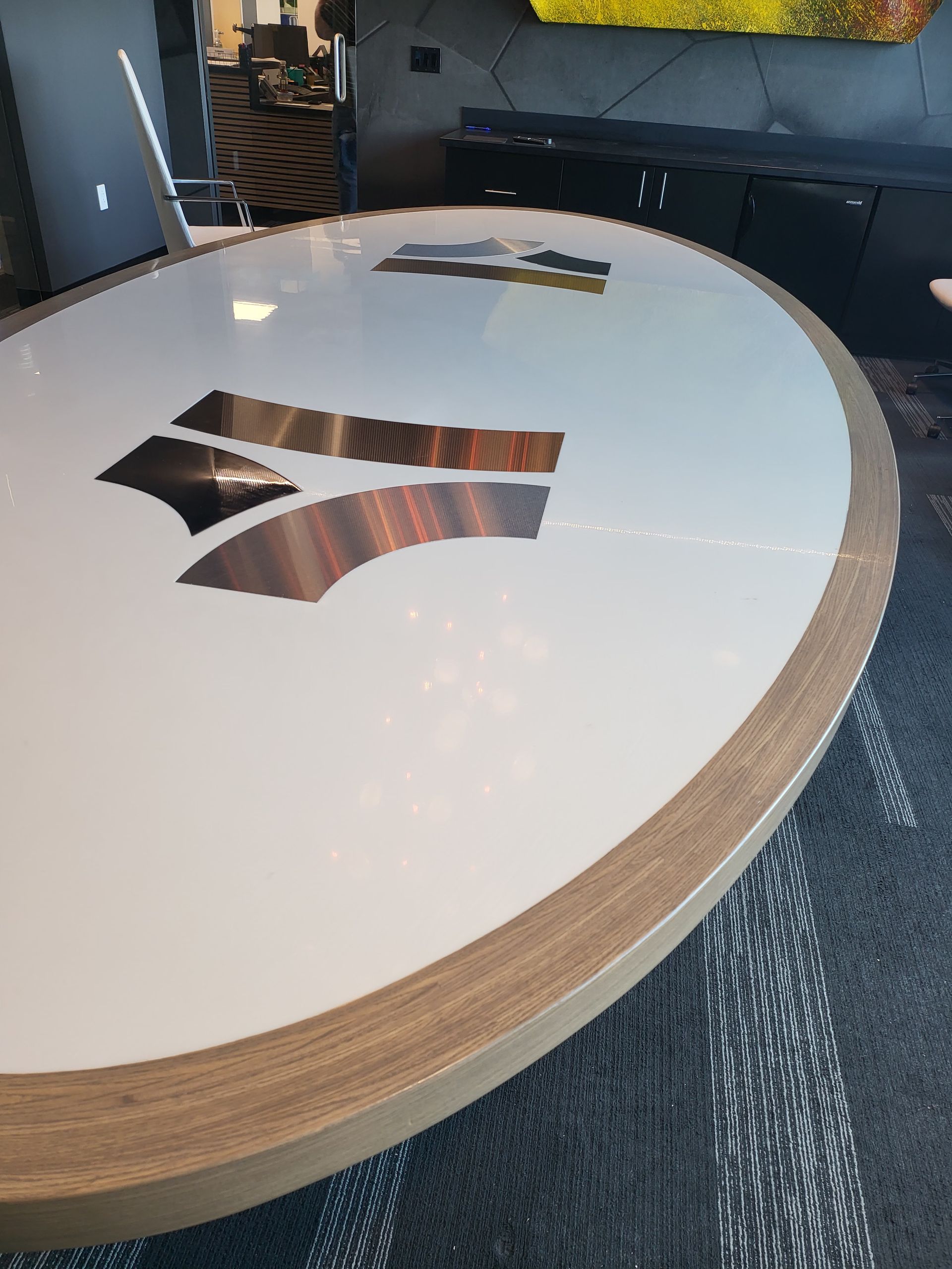 A round table with a bank of america logo on it
