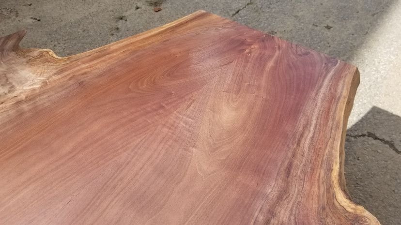 A close up of a piece of wood on the ground.