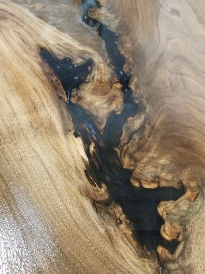 A close up of a piece of wood with a hole in it.