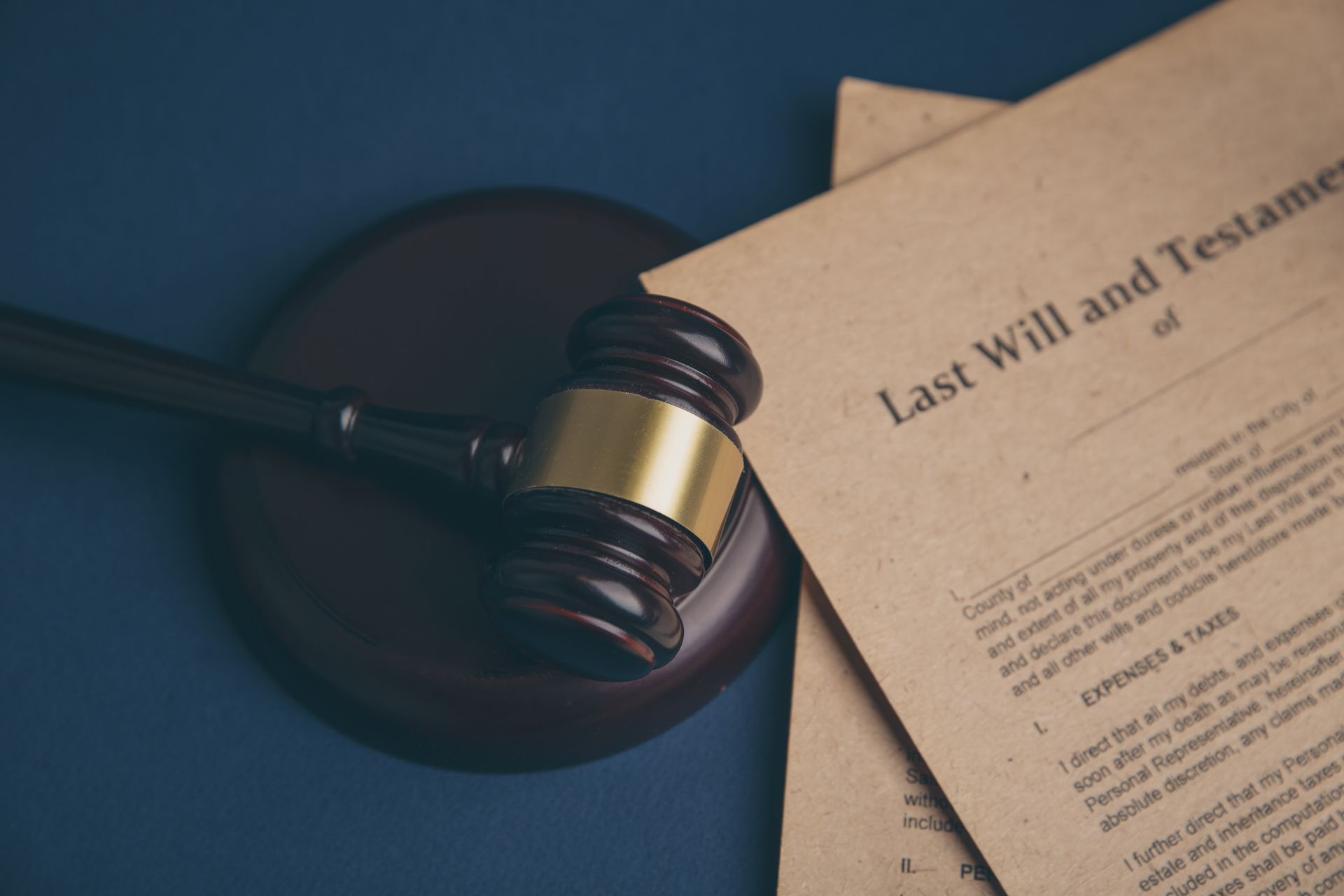 Gavel resting on sound block next to a 