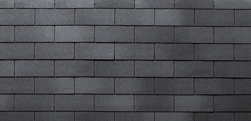 Bardeaux de toiture rectangulaires gris foncé.